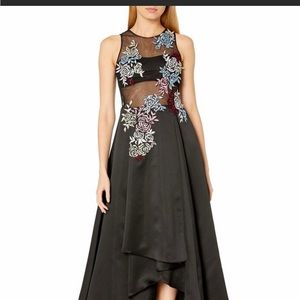 High low black stain gown with embroidered flowers
